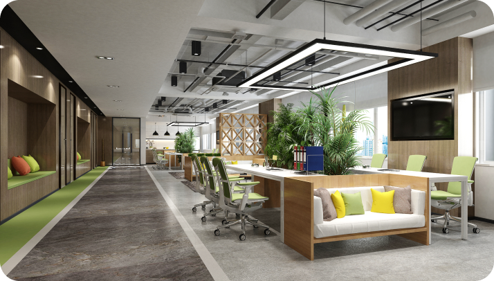 A large open office space with lots of green plants.